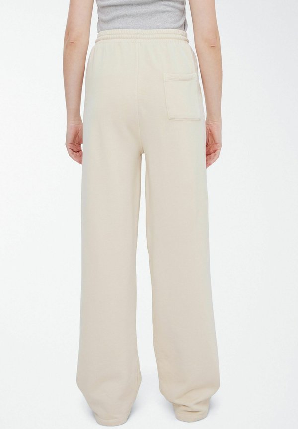 BASIMONA - Tracksuit bottoms - summer sand3