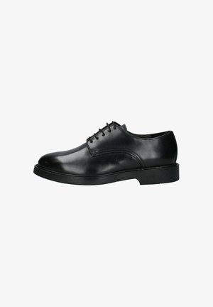 Scarpe nere in pelle con lacci, dalla finitura liscia, punta arrotondata e suola in gomma bassa. Presentano cuciture sottili ed elementi di design classico.