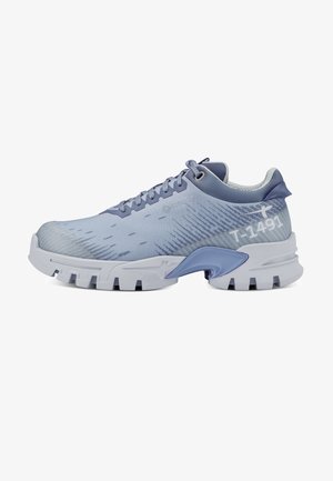 Light blue athletic shoe featuring a textured upper, sturdy white sole, and prominent heel support with subtle branding details.
