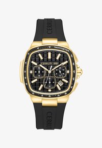 Atlasīts, black and gold coloured