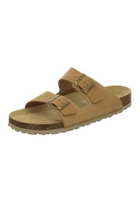 Tan leather slide sandal with two adjustable straps and metal buckles, textured insole, and a cork and rubber outsole.