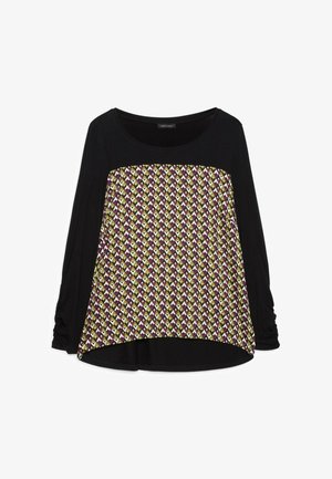 Sort langærmet top med løs pasform og en frontpanel med et flerfarvet geometrisk diamantmønster i lilla, gul og hvid.