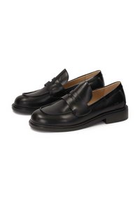 Black leather loafers featuring a sleek design, rounded toe, and front strap detail. Solid color, smooth texture, and subtle branding on heel.
