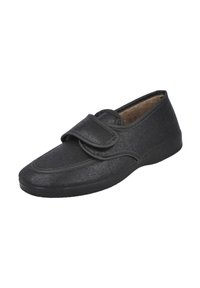 Zapato negro hecho de material texturizado, con una tira de velcro, punta redondeada y suela de goma. Diseño sencillo con acentos mínimos.