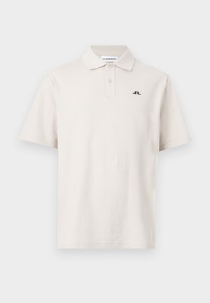 Off-white short-sleeve polo shirt with two buttons, collar, and small black logo on the left chest.