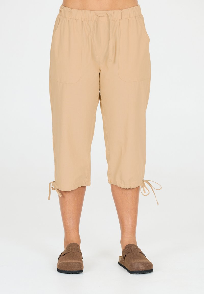 Vaaleanbeige, kevyt cropped-housut, joissa on joustava vyötärö, nyöritys ja kaksi sivutaskua; helman säätöä varten on nauhoja.