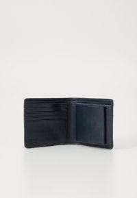 Navy leather wallet featuring multiple card slots, a pocket for ID or cash, smooth texture, and a subtle embossed logo.