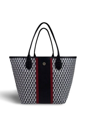 Geometric patterned tote bag with a textured exterior in gray and black. Features black leather accents and a central red stripe.