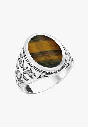 Silberner Ring mit einem ovalen Tigerauge-Stein in der Mitte und filigranen Blumenmustern, die mit kleinen Kristallen an den Seiten des Rings verziert sind.