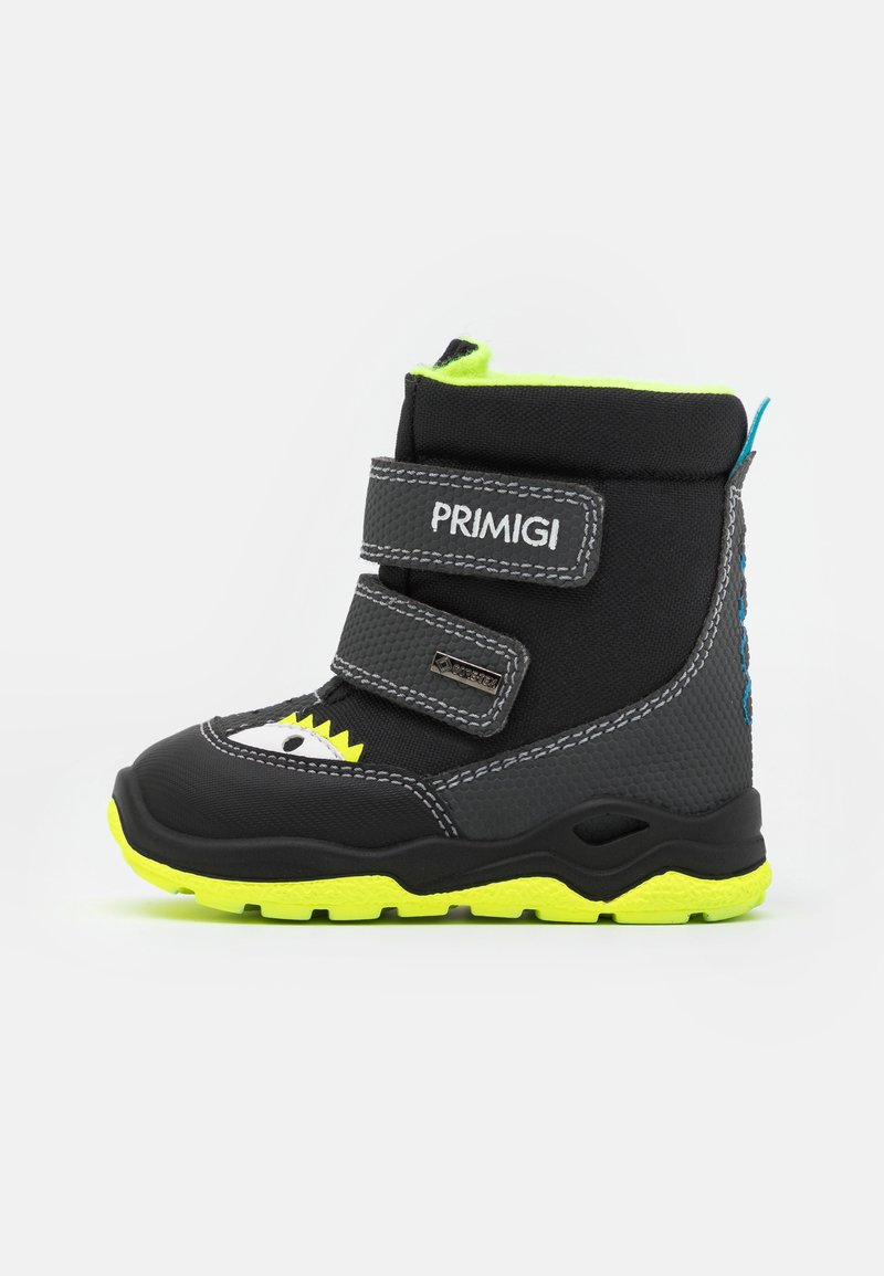 Botte noire imperméable avec deux sangles Velcro, accents et semelle jaune fluo, talon gris caoutchouté, et design ludique d'œil et de dents.
