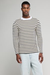Gestreiftes Langarmshirt mit einem cremefarbenen Hintergrund und marineblauen Streifen; verfügt über einen weißen Rundhalsausschnitt. Lässige Passform mit einer glatten Textur.