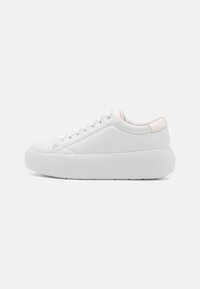 White sneaker with a smooth leather upper, rounded toe, platform sole, and soft pink heel accent. Features six eyelets for laces.
