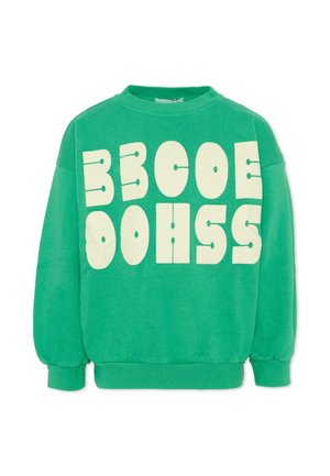 Felpa verde con collo a girocollo e grandi lettere beige a blocchi che formano la scritta "BE COOL DOHSS" sul petto.