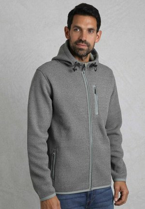 Gray textured zip-up hoodie with a hood, featuring contrasting light gray trim, side zip pockets, and adjustable drawstring at the neck.