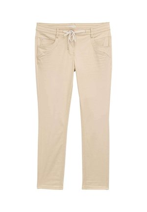 Beige pants made of soft fabric; features a drawstring waist, two front pockets, and a fitted design with subtle stitching details.