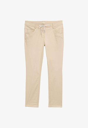 Beige pants made of soft fabric; features a drawstring waist, two front pockets, and a fitted design with subtle stitching details.