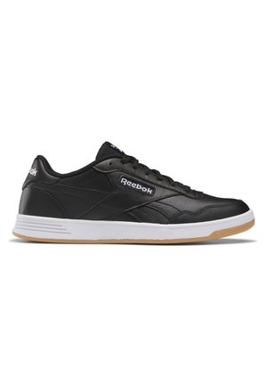 Sort lav Reebok sneaker med hvid mellemsål og gumiydersål, snørelukning og Reebok-logo på siden og hælen.