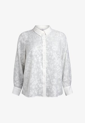 White long-sleeve blouse featuring a floral pattern, button-up front, and a classic collar. Made from lightweight, sheer fabric.