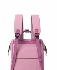Pink backpack with wide, padded shoulder straps, zippered side pocket, and durable texture. Features a central carry handle for versatility.