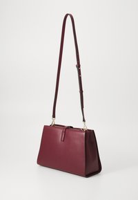 Tommy Hilfiger LIBRE SATCHEL - Rankinė - deep rouge