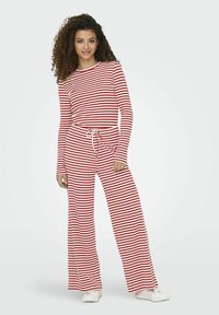 Rode en witte gestreepte loungekleding set met lange mouwen en wijde broekspijpen, met een trekkoord in de taille. Zacht, ademend materiaal.