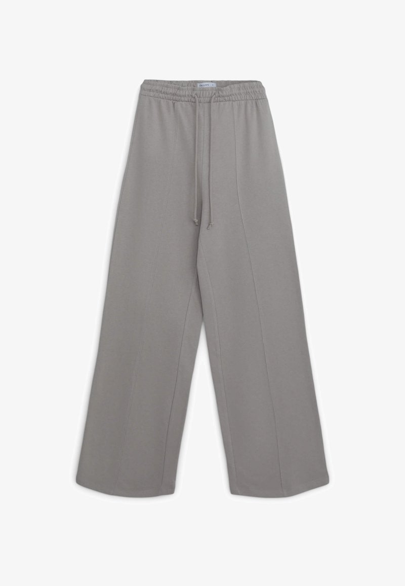 Graue Sweatpants mit weitem Bein, elastischem Bund und Kordelzug, mit vertikalen Nahtdetails vorne und hinten.