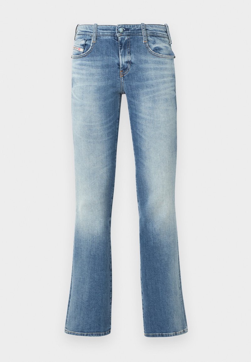 Lyseblå denim jeans med vide ben, forlommer, bæltestropper og falmede detaljer langs lårene. Glat tekstur og klassisk pasform.