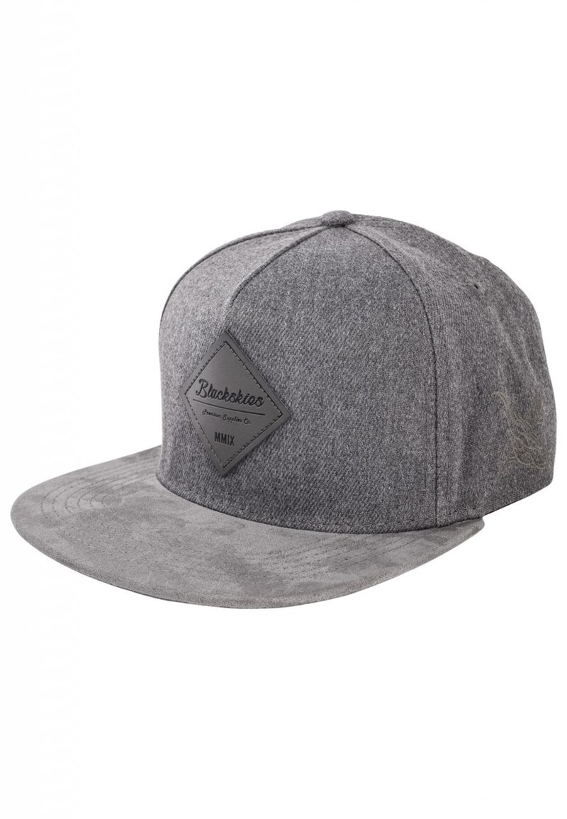 Gray snapback cap with a textured wool upper, flat brim, and a rubber patch featuring brand name and year on the front.