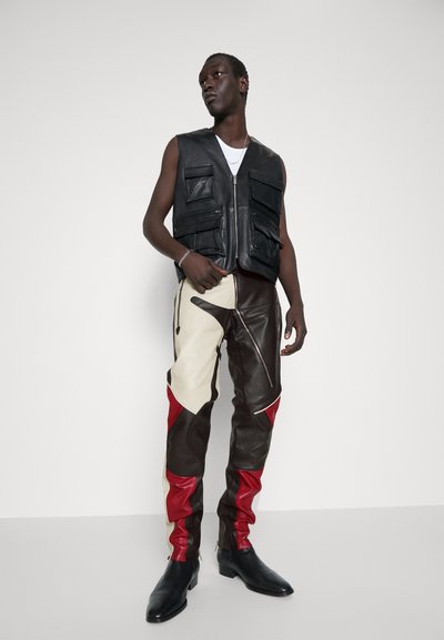 STUDIO ID ANTOINE BIKER TROUSERS - Usnjene hlače - black/red/off white