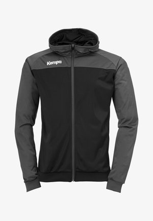 Schwarze und graue Zip-Jacke mit Kapuze, ausgestattet mit einer glatten Textur, kontrastierenden Ärmeln und dem "Kempa"-Logo auf der Brust.
