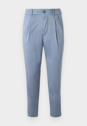 Lyseblå, tapered bukser laget av glatt stoff med flat front, legg, og knappeåpning. Har side lommer og oppbrettede hems.