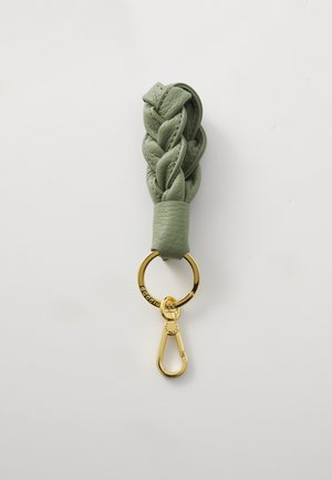 Green braided leather keychain with a gold-colored metal ring and clasp, featuring smooth texture and detailed stitching.