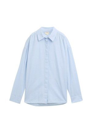 Light blue long-sleeve shirt made of cotton. Features a classic collar, center button closure, and slightly puffed sleeves with a relaxed fit.