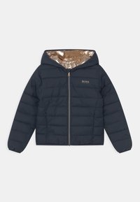 Navy puffer jacket with a hood, gold interior, zip closure, and "BOSS" logo on the chest. Features quilted texture and elastic cuffs.