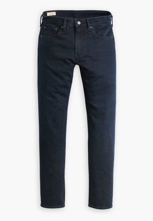 Mørkeblå denimjeans med rett snitt, klassisk fem-lommers design og metallknapplegging. Har diskret søm og en myk tekstur.