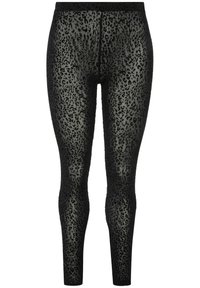 Leggings neri con una finitura traslucida, caratterizzati da un motivo maculato di dimensioni variabili, texture liscia e una vita elastica.