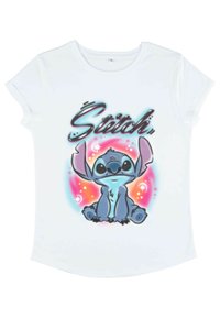 Bílý bavlněný tričko s barevným grafickým motivem modré mimozemské postavy "Stitch" s růžovými a fialovými akcenty v pozadí.