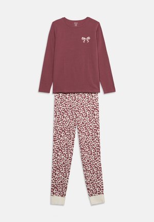 Haut bordeaux à manches longues avec petit détail nœud, associé à des leggings blancs avec imprimé léopard bordeaux et poignets crème.