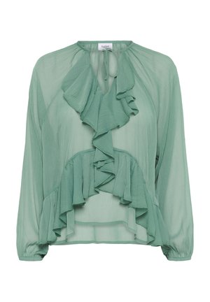 Grøn chiffonbluse med en flæsefront, lange ærmer med indsamlede manchetter og en bindedetalje ved halsen.