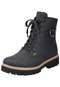 Bottines noires avec une tige en cuir lisse, bout rond, lacets à l'avant, accent circulaire sur le côté et semelle en caoutchouc striée.