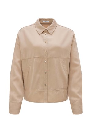 Camicia beige con bottoni e colletto, realizzata in tessuto liscio. Presenta una vestibilità su misura, tasche laterali e accenti a coste sulle maniche.