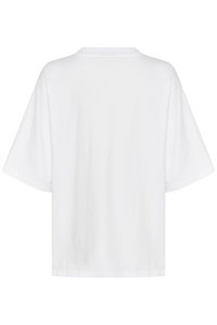 Tricou alb din bumbac cu o croială lejeră, mâneci scurte și guler circular cu nervuri. Textură netedă fără modele sau detalii vizibile.