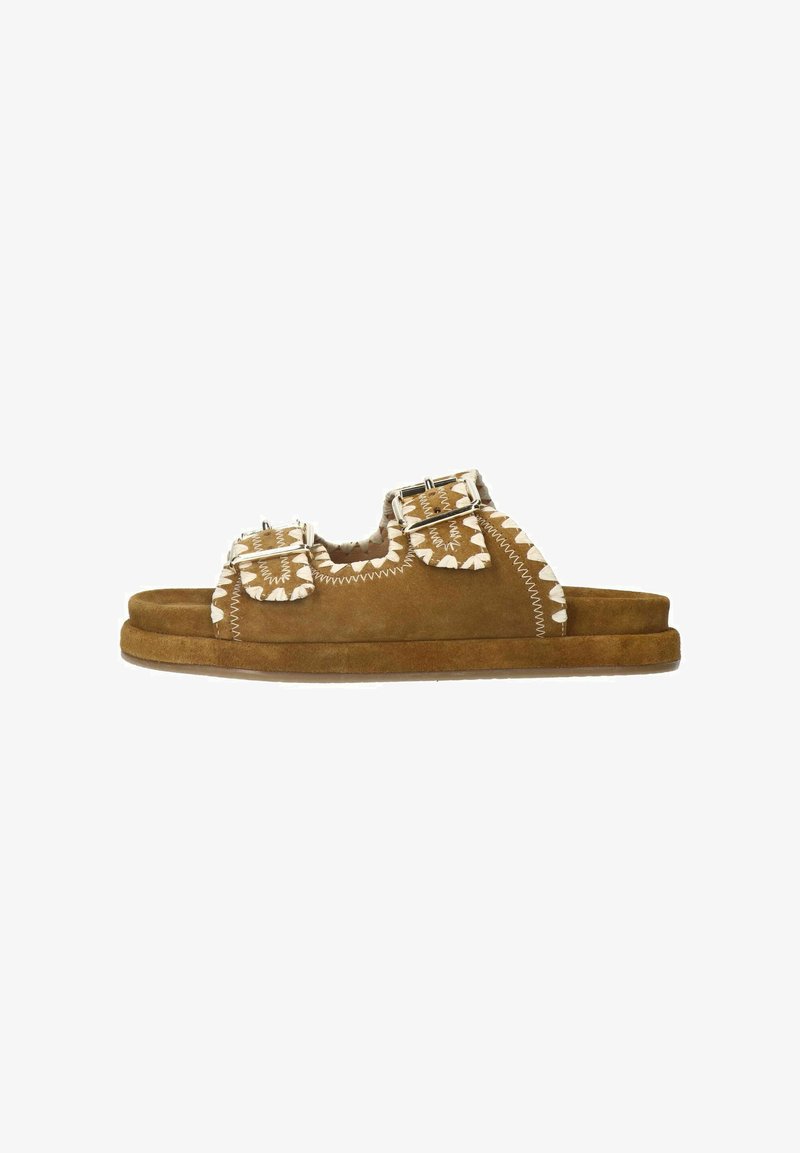 Brown suede sandals with double buckle straps, decorative stitching, open toe design, and flat soles. Textured accents enhance the design.