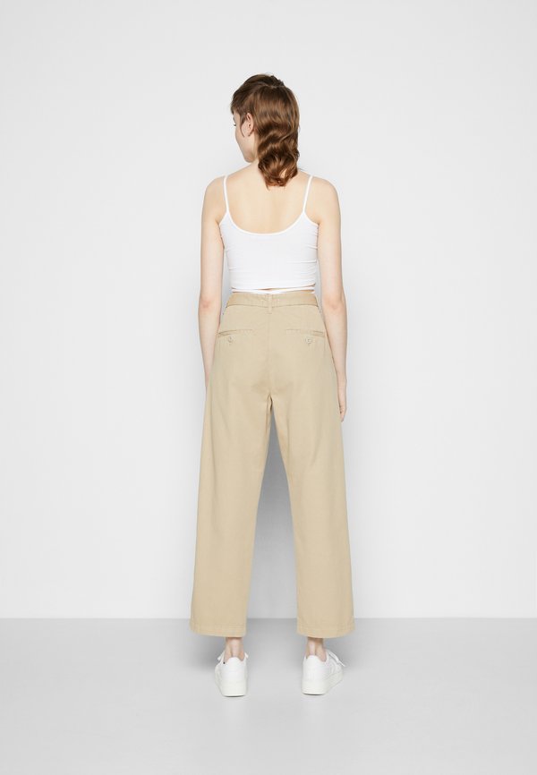 CARA PANT - Trousers - wall4
