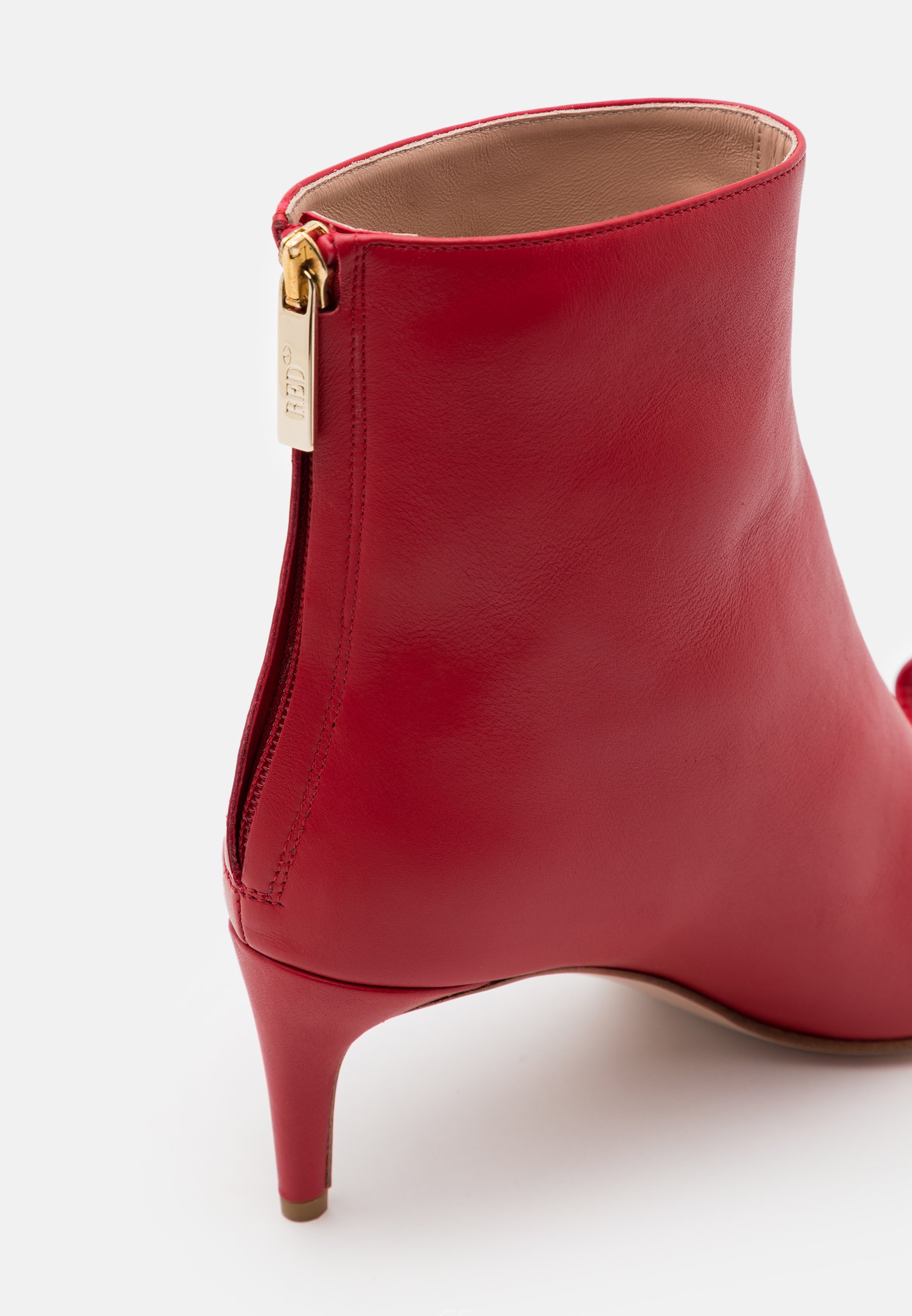 red leather ankle boots