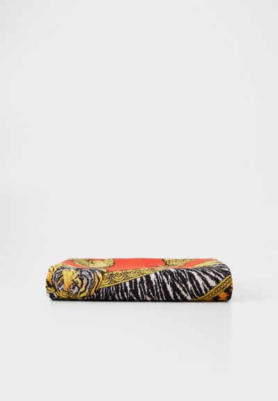 Multicolor scarf featuring a bold tiger and zebra pattern, with gold accents on a red and black background, soft fabric, rectangular shape.