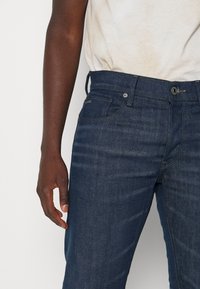 G-STAR 3301 SLIM - Calças de ganga justas - dark blue denim