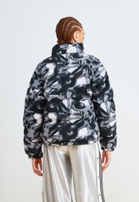 The North Face POLAR NUPTSE JACKET - Dūnu jaka - black
