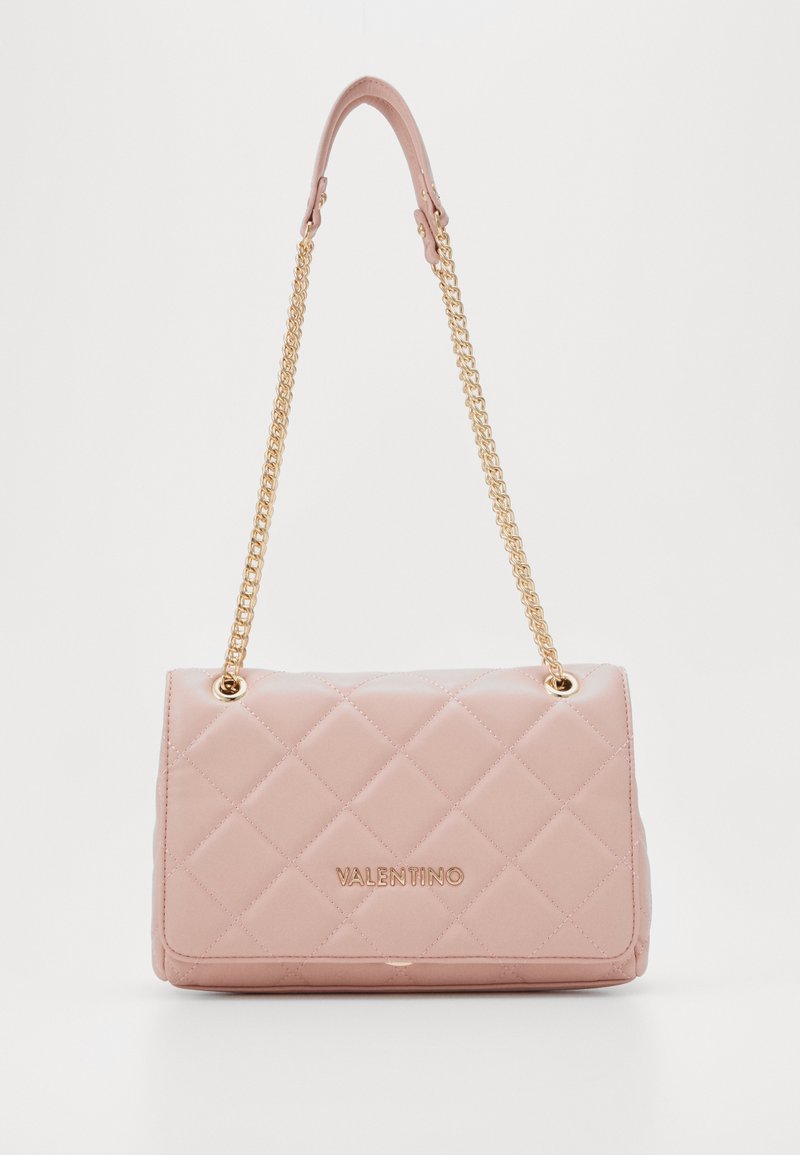 Quilted pink handbag with gold chain strap, featuring a flap design and embossed logo. Smooth texture with a regular rectangular shape.