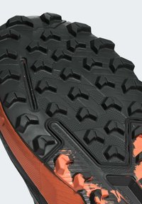 Adidas Terrex AGRAVIC FLOW 2.0 - Scarpe da trail running - core black   grey four   amber tint